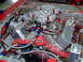 1990 Ford Mustang - Custom engine setup dual carburetors and performance fuel system components.