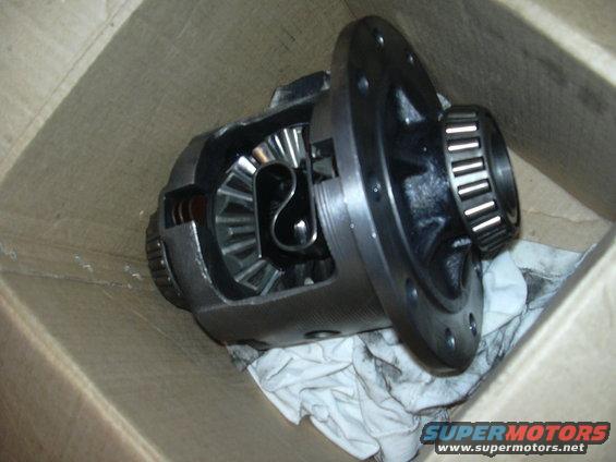 Differential carrier with gears and bearing in a cardboard box