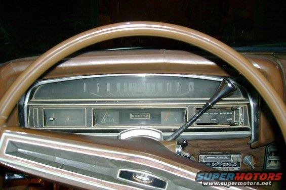 1971 Ford Ranchero interior dashboard with brown steering wheel and gauges