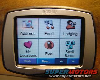 Garmin GPS unit with Address, Food, Lodging, My Locations, Fuel, and Spell Name icons