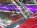 1994 Ford Probe - Close-up view of a red car's interior, with a purple car seen through the windshield.