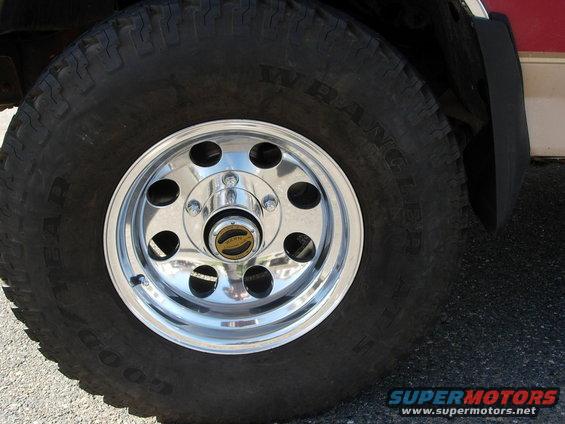 Stock wheels rubbed on torsion bar & radius arm.   They were 15x7 with 4" backspacing.   New tires turn with no rub with 3 5/16" backspace.