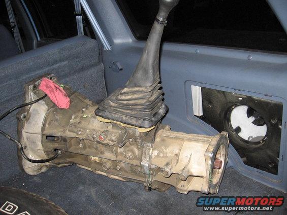 Manual transmission and shifter assembly removed from a vehicle interior