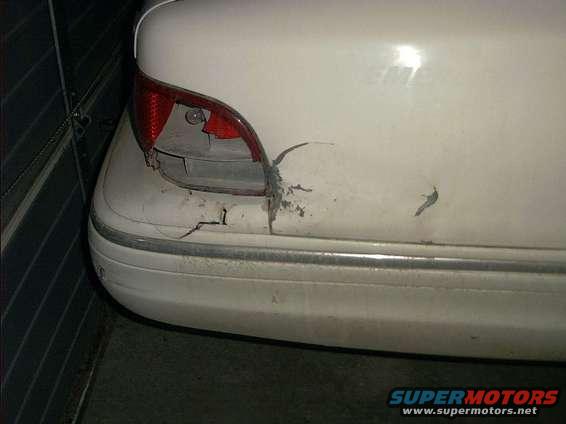 damage.jpg dont drive drunk kiddies! the last owner decided to play sparkin hot rods with it. then did the old bang it out with a hammer and screw it up worse bit.