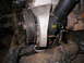 1978 Ford Bronco - Engine power steering pump and associated pulleys are shown in this close-up view.