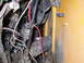 1978 Ford Bronco - Close-up view of complex wiring and components within a vehicle's engine compartment.