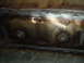 1996 Ford Bronco - Close-up view of welded metal with circular fasteners, likely part of a vehicle repair.