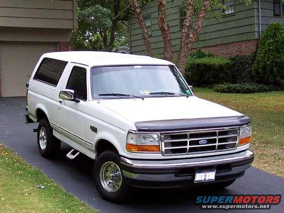 White 1996 Ford Bronco parked in driveway