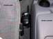 1996 Ford Bronco - One of my Motorola FRS handhelds. I screwed the mounting/charging bracket into the floor and will tap into the electric…