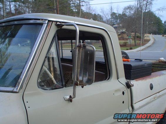 Cream 1967 Ford F-250 pickup truck, driver's side view