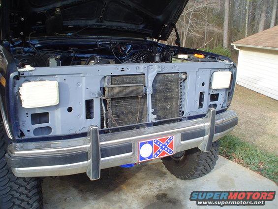 1984 Ford Bronco front end with grille removed, hood open