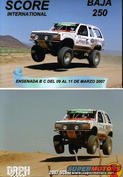Modified Ford Explorer jumping during a SCORE International Baja 250 race