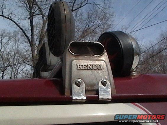 Close-up of Kenco snorkel and two off-road lights mounted on a vehicle's roof
