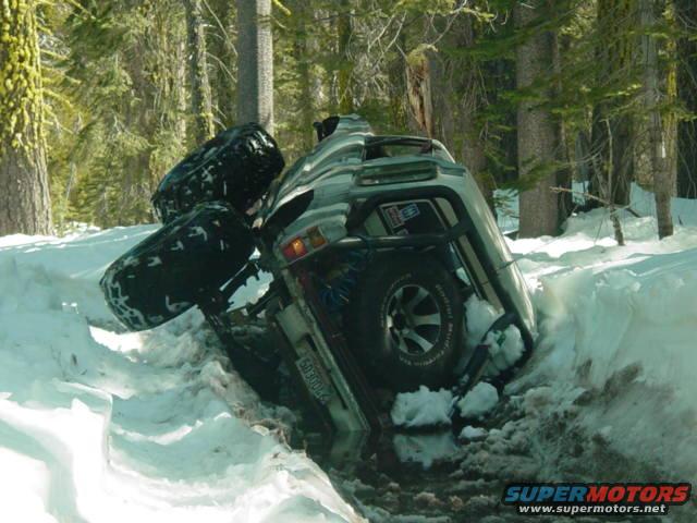 1986 Ford Bronco stuck in snow, 3/4 front view