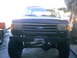 1989 Ford Bronco - Front view of a 1989 Ford Bronco, a custom bumper and winch.