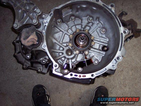 Transmission housing with internal components and a rag stuffed inside