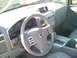 2006 Nissan Armada - Interior view of a 2006 Nissan Armada, focusing on the driver's side controls and dashboard.
