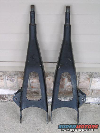 two black control arms