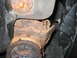 1994 Ford Bronco - Close-up view of corroded undercarriage components, showing significant rust damage.