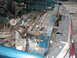 1994 Ford Bronco - Close-up view of a vehicle's engine bay, focusing on the radiator and associated plumbing.