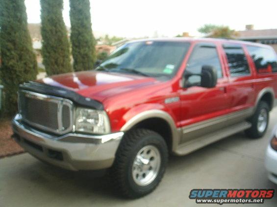 Red 2000 Ford Excursion, 3/4 front view