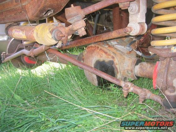 '76 F-100 with inverted 'Y' type steering. 4" lift and dropped trac bar mount. Note tie rod end is part of pitman arm, not drag link.