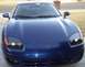 1994 Dodge Stealth - A blue Dodge Stealth is parked outside a brick building, viewed from the front.