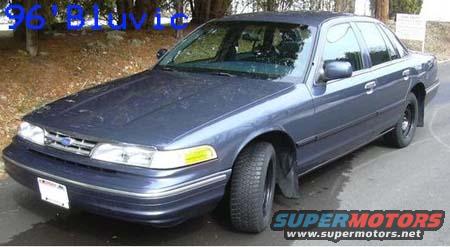 Blue 1996 Ford Crown Victoria parked outside