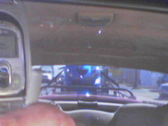 Crappy cell phone pic looking at the rear view mirror.
