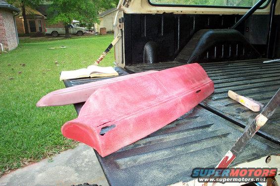 Red door panels in a truck bed with an open book