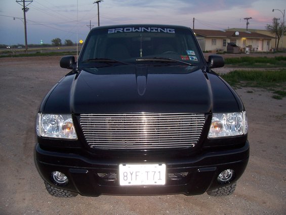 Black 2003 Ford Ranger front view with chrome grille and Browning decal