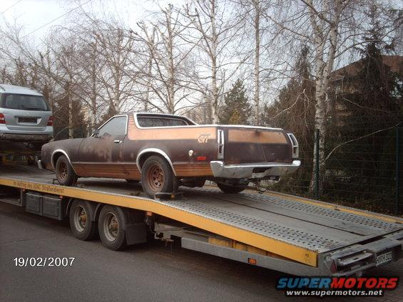 1979 Ford Ranchero, rear view, brown with GT badge, on a tow truck