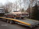 1979 Ford Ranchero - A brown 1979 Ford Ranchero is loaded onto a tow truck, with another vehicle visible on the left.