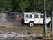 1989 Ford Bronco - Two off-road vehicles, a cream Land Rover Series III and an orange Jeep Wrangler, participate in an event on March 17, 2007.