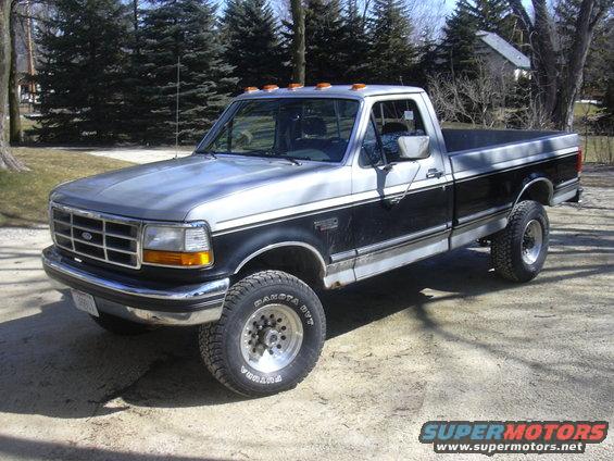 Two-tone 1992 Ford F-250 pickup truck, front 3/4 view