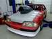 1990 Ford Mustang - Modified 1990 Ford Mustang set up for drag racing, a prominent hood scoop.