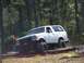1989 Ford Bronco - This 1989 Ford Bronco navigates a challenging obstacle during an off-road event.
