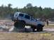 1989 Ford Bronco - A silver SUV tackles an off-road obstacle course on March 18, 2007.