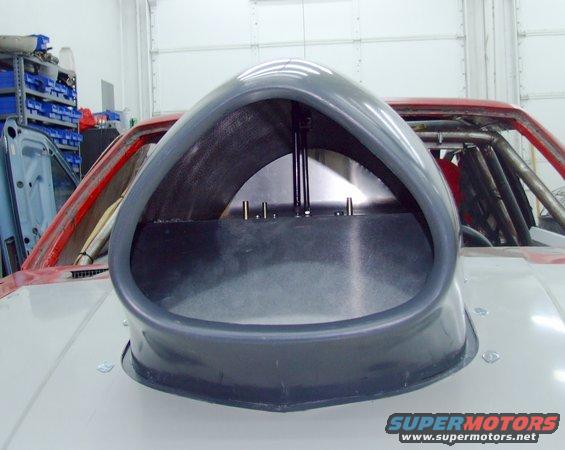 aftermarket hood scoop on a car