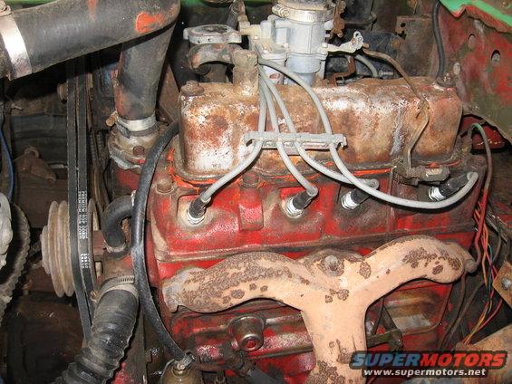 Engine block with spark plug wires and carburetor