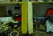 1993 Ford Bronco - Workbench with two padded parts, possibly for an arm rest, and various tools and supplies.