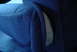 1993 Ford Bronco - Detail of a blue fabric seat cushion, showing texture and construction.