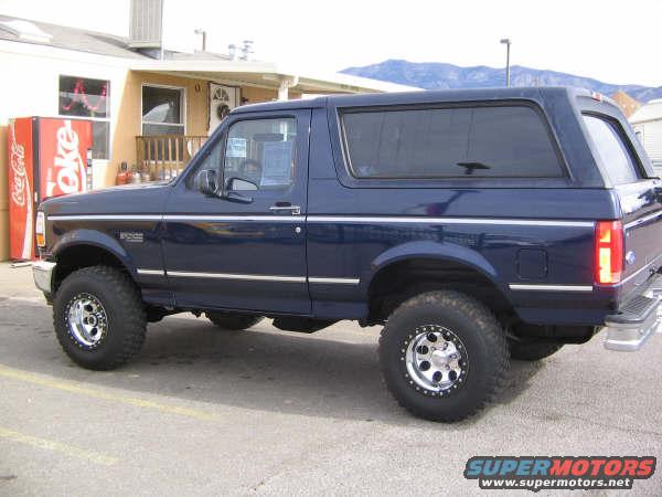 Dark blue 1995 Ford Bronco side view