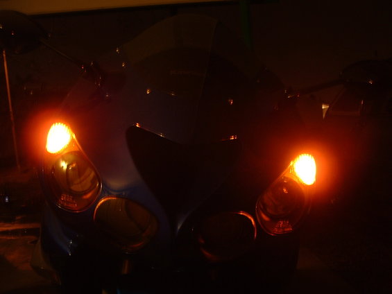 Here is how the bike looks with both clear bulbs removed and replace with orange bulbs.