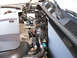 1999 Ford Crown Victoria - Close-up view of the engine compartment of a 1999 Ford Crown Victoria, revealing various mechanical parts and connections.