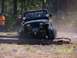 1989 Ford Bronco - A Jeep Wrangler navigates an obstacle course with large logs on March 18, 2007.