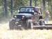 1989 Ford Bronco - This Jeep Wrangler is navigating an off-road obstacle course.