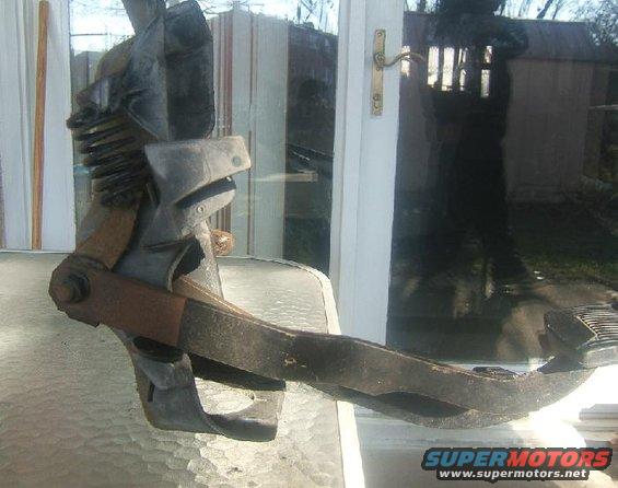 Clutch pedal assembly with spring and bracket