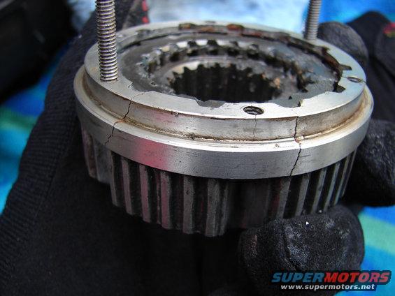 close-up of a cracked manual locking hub with splines visible