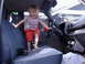 1986 Toyota Pickup/SR5 - My daughter Blossom climbing around on the "new" benchseat. The seat is out of the 91 that can be seen behind her.